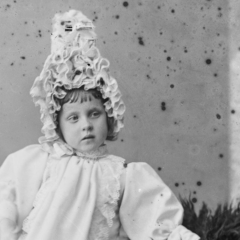 Young Girl with Elaborate Headwear