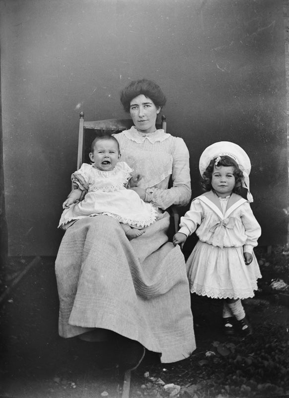 Mother With Children of Contrasting Emotions