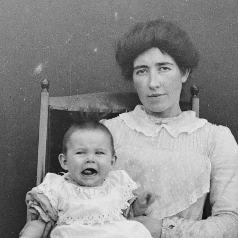 Mother With Children of Contrasting Emotions