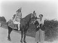 Horse Riding Girl in Queenly Garb