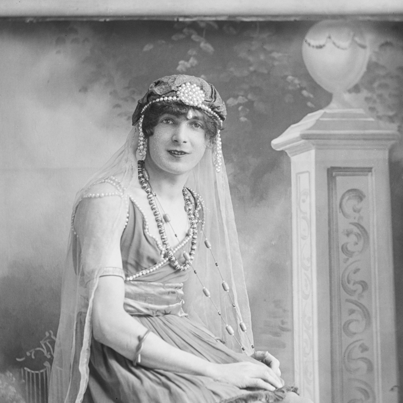 Seated Cross Dressing Individual