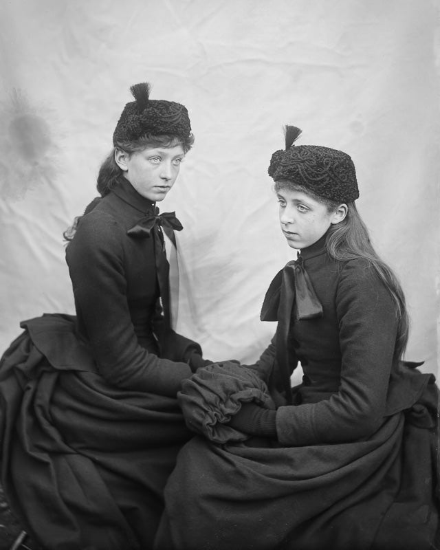 Melancholy Young Women Dressed in Black